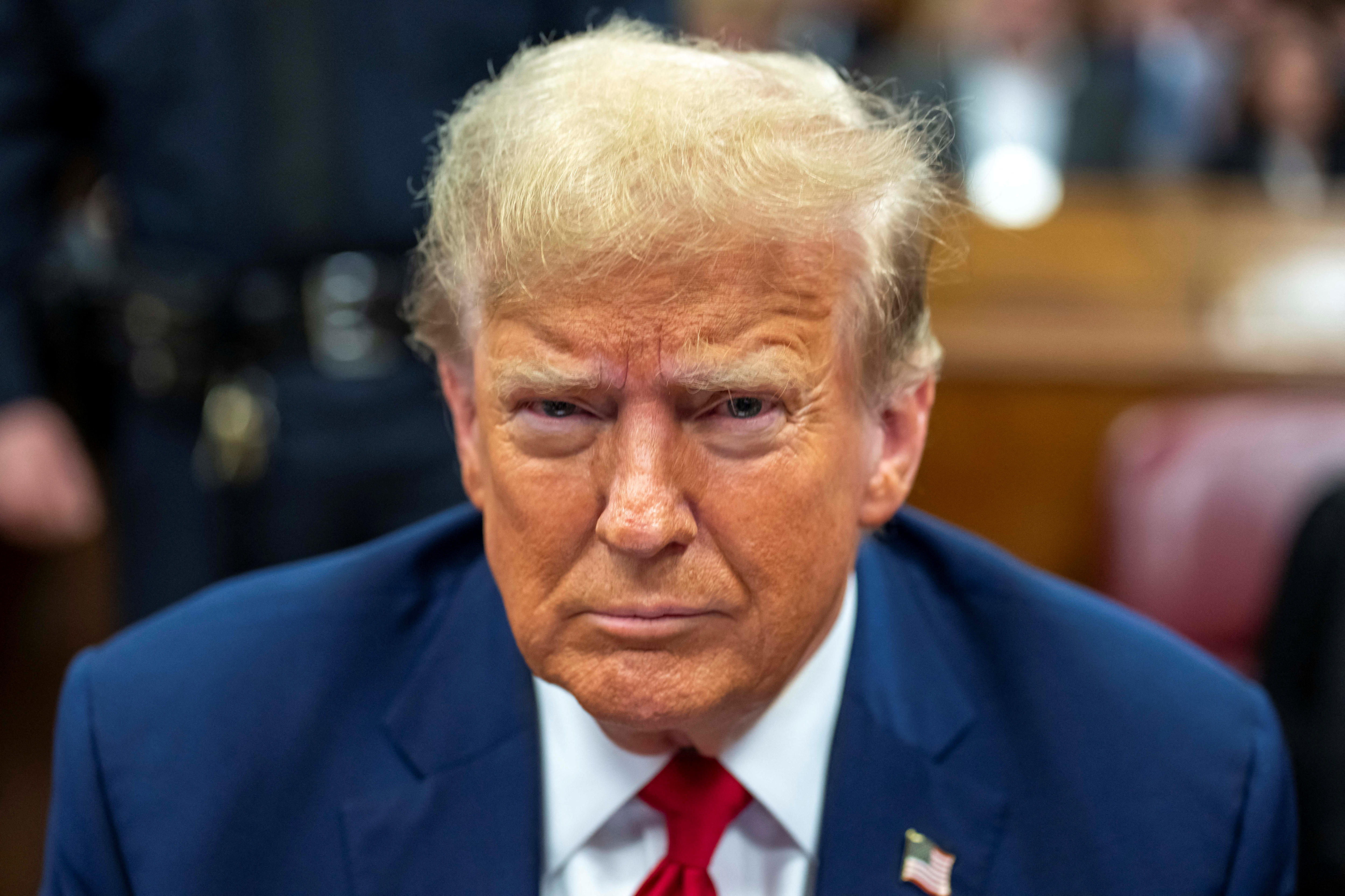 Tabloid publisher says he wrangled with Donald Trump over who should buy sex stories