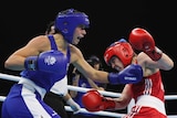 Australia's Skye Nicolson (L), against Northern Ireland's Michaela Walsh in women's 57kg boxing.