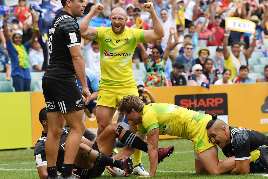 James Stannard celebrates an Australian try during this year's Sydney 7's rugby competition