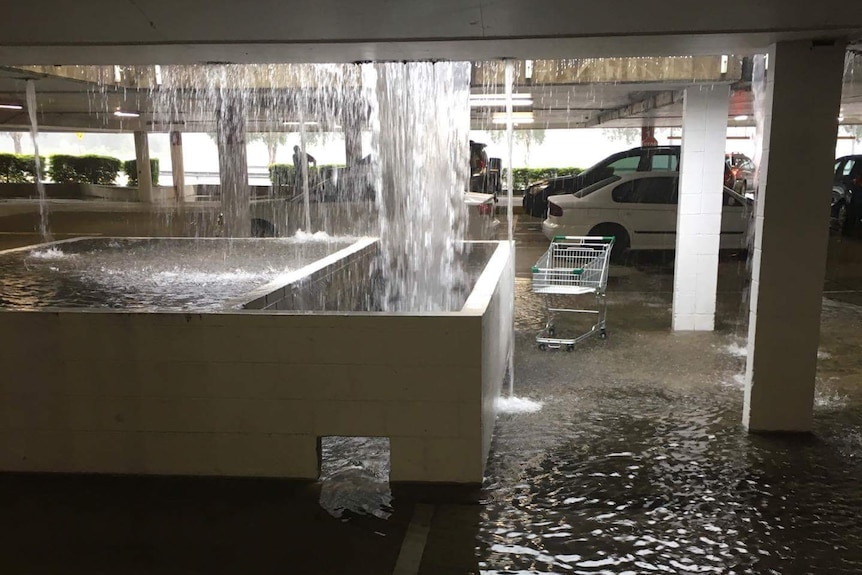 Brookside Shopping Centre carpark is heavily flooded