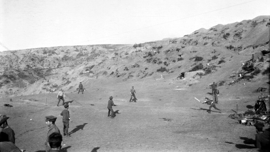 1915 black and white photo of Australian soldiers playing cricket at Shell Green on the Gallipoli peninsula.