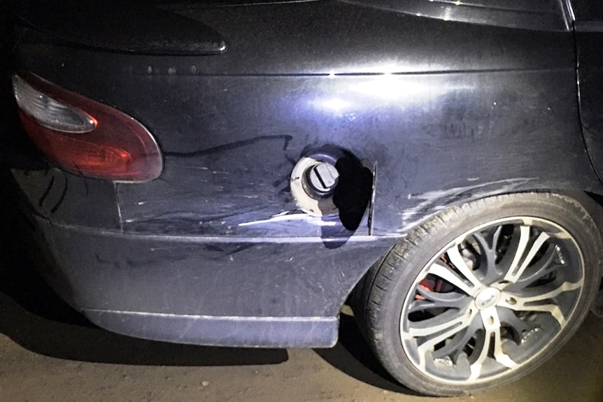 Car damaged after collision with train at Westbury, Tasmania.