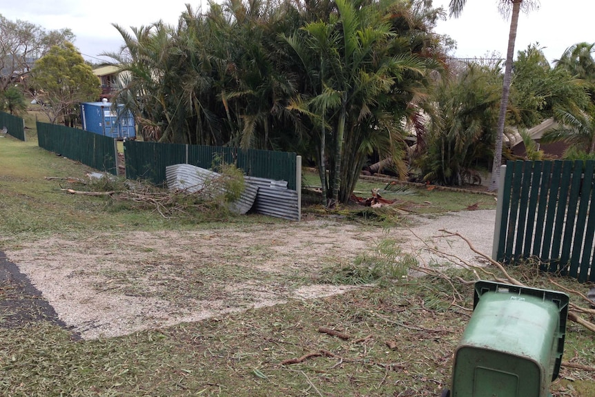 Storm debris scattered on the streets of Fernvale.