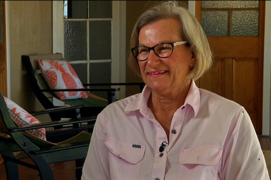 Ann Ballinger sitting on her porch.