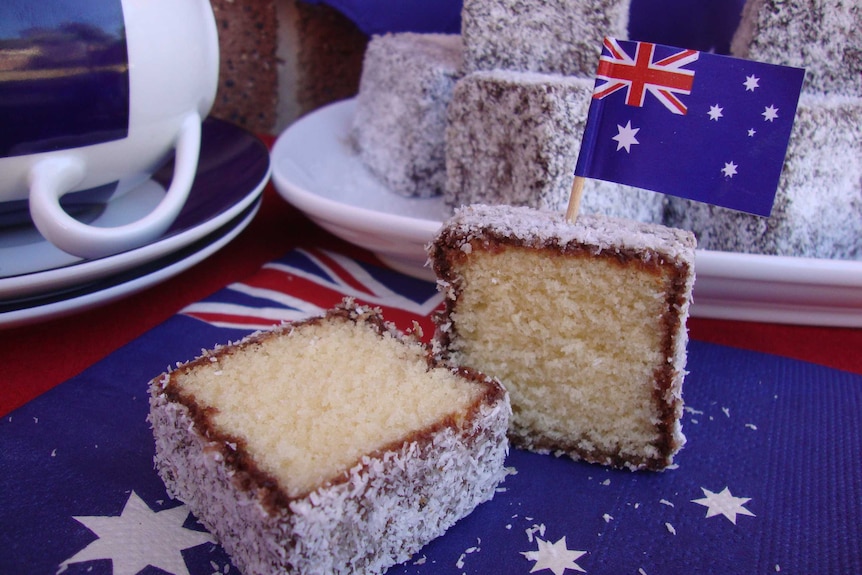 Close up of a traditional lamington that's cut in half