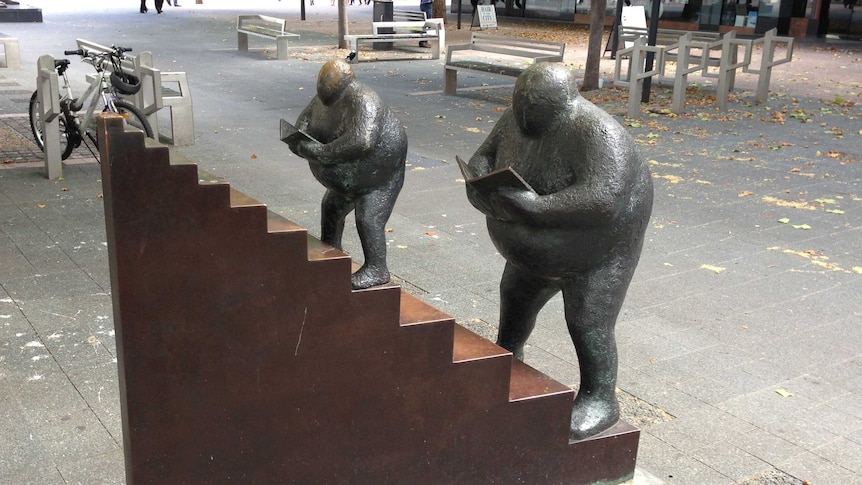 A total of three small human figures have been stolen in the past two years from the sculpture, On the staircase by Keld Moseholm.