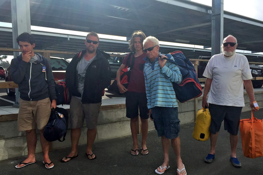 The crew of Seduction arrive at Launceston airport