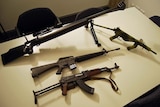Undercover officers managed to buy an AK-47 and a sniper rifle from a targeted weapons dealer.