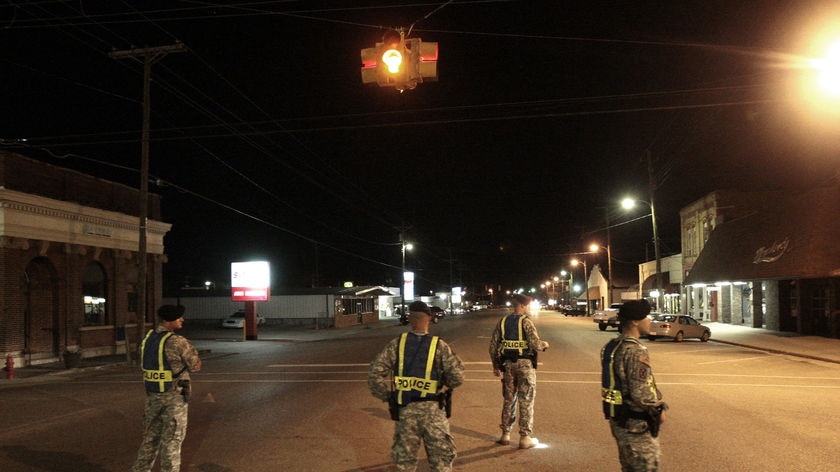 US Army soldiers from Fort Rucker patrol the downtown area of Samson