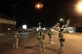 US Army soldiers from Fort Rucker patrol the downtown area of Samson