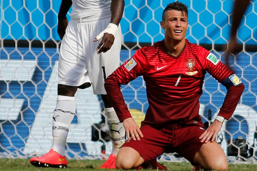 Cristiano Ronaldo reacts after missing a goal scoring opportunity against Ghana.