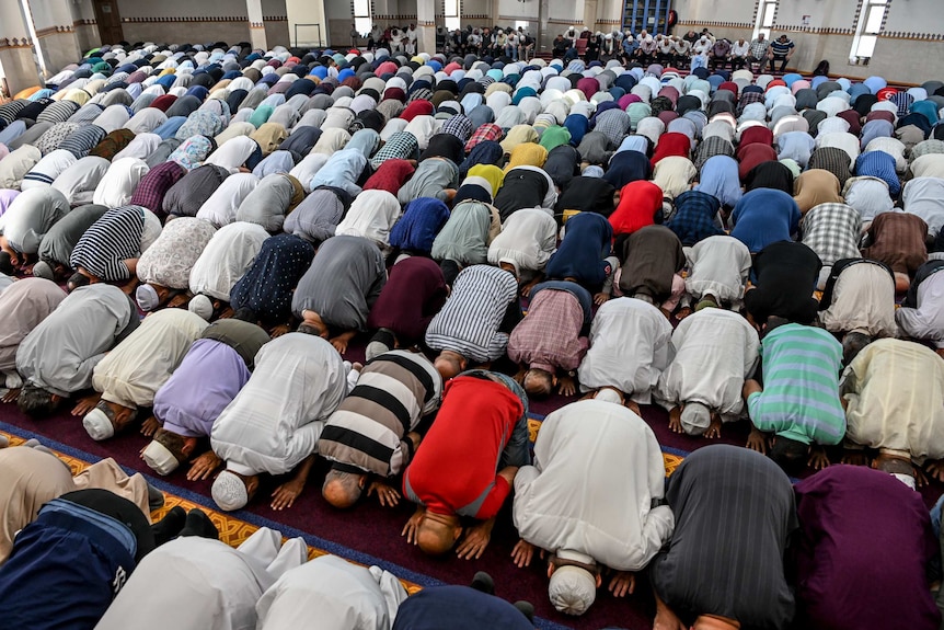 Men are seen praying in the Lakemba Mosque during the Muslim call to pray. Photo taken on October 1 2019