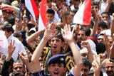 Yemeni anti-government protesters celebrate what they said was the fall of Yemen's regime