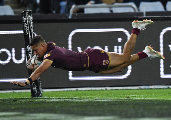 Dane Gagai leaps to score a try for the Maroons in Origin II
