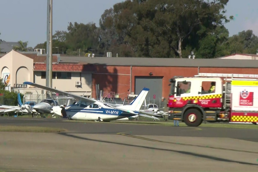 a light plane crashes on the tarmac after an emergency landing at bankstown airport