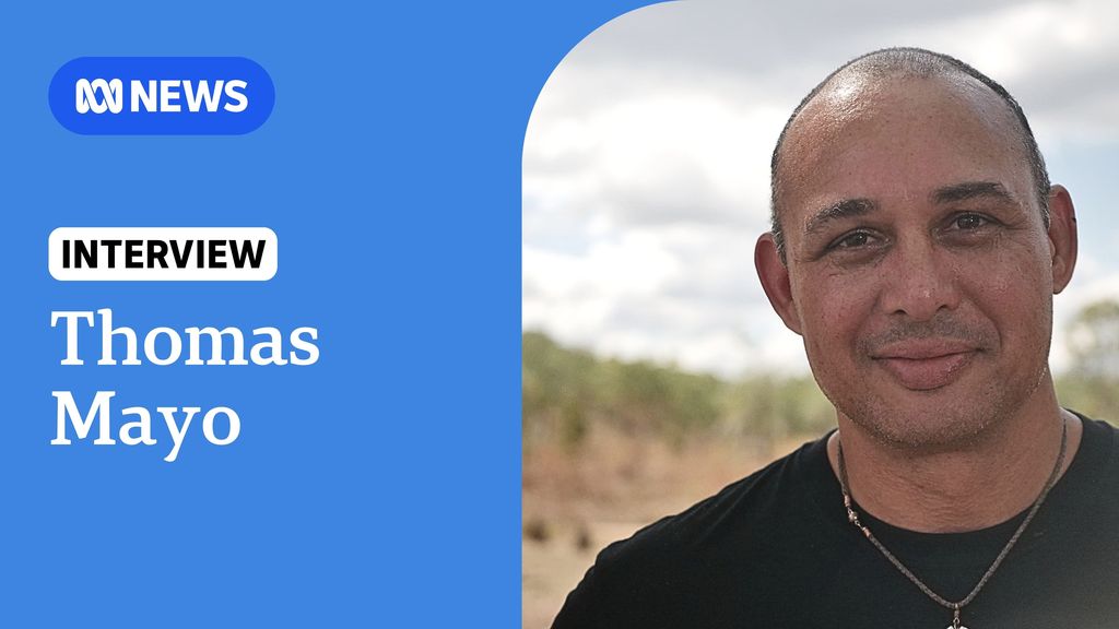 Interview Thomas Mayo. Man standing looking at the camera. 