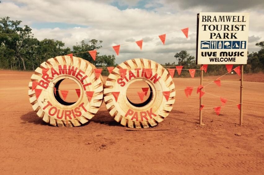 Two big white tyres out the front of a remote tourist park in Cape York.