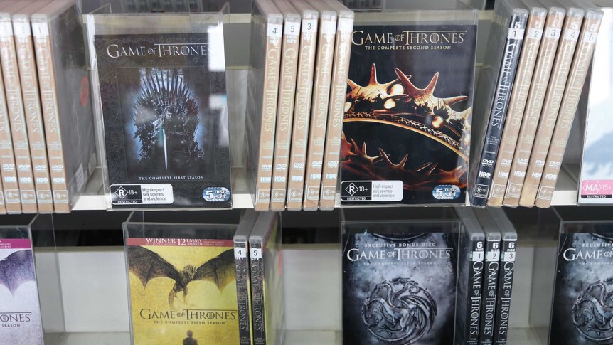 Close-up of DVDs of past seasons of Game of Thrones TV show.