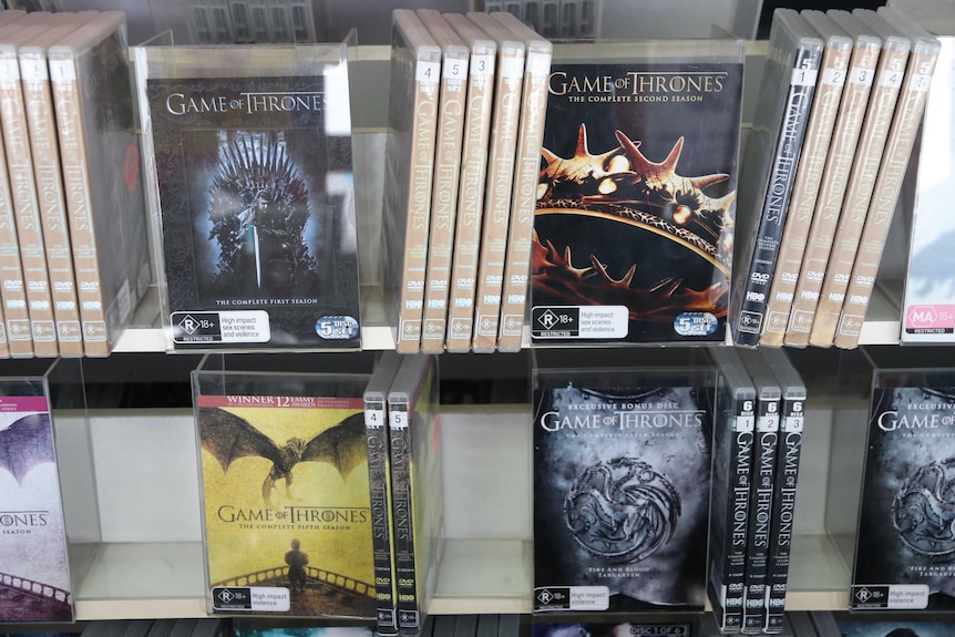 Close-up of DVDs of past seasons of Game of Thrones TV show.