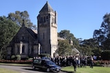 Mourners arrive for the funeral service of Thomas Kelly at Kings College Chapel in Sydney.