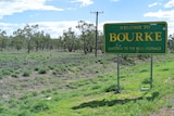 The entrance to the town of Bourke, green after rain.