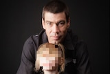 A man with short dark hair pictured with his daughter whose face is pixellated