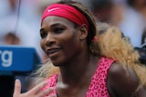 Serena Williams shakes hands with Kaia Kanepi