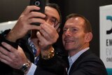 Tony Abbott poses for a selfie