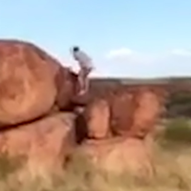 A man was filmed defecating on Karlu Karlu, also known as the Devil's Marbles