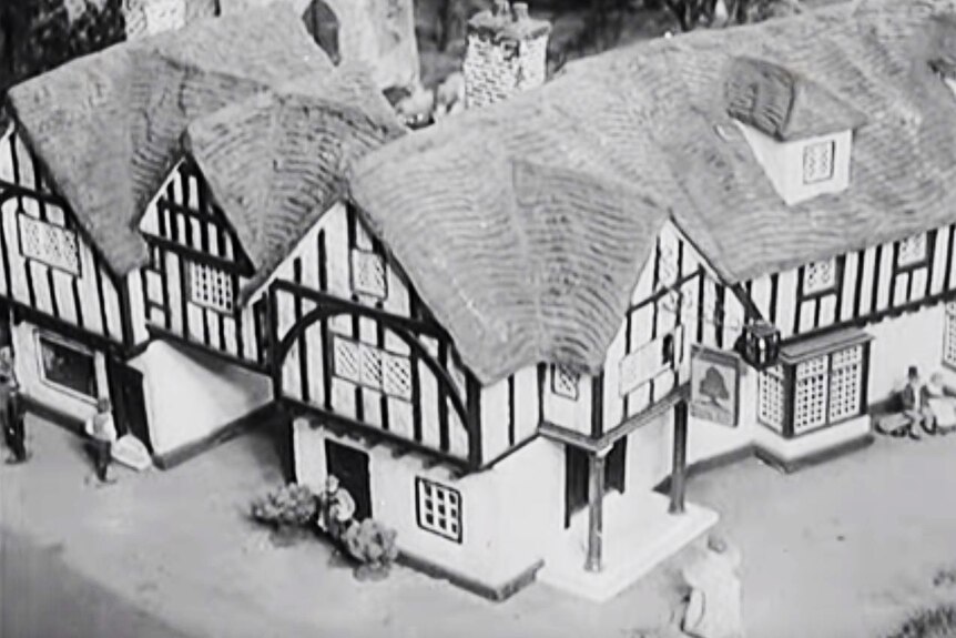 Close-up of model Tudor village dwelling.