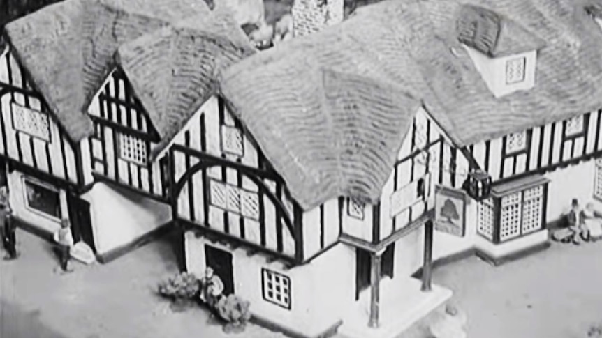 Close-up of model Tudor village dwelling.