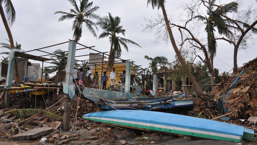 Upturned boats and damaged buildings along the coast after Cyclone Hudhud hits.