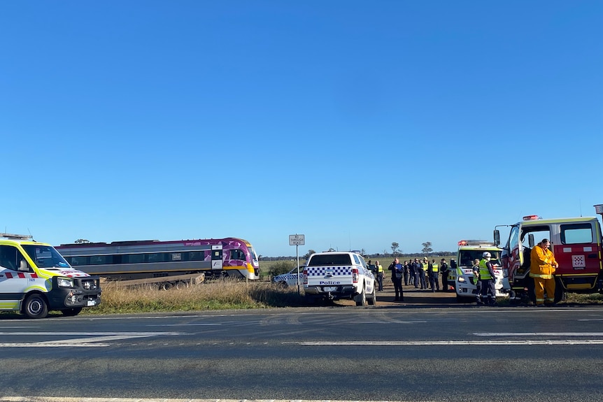 Emergency vehicles at the scene of a train derailment