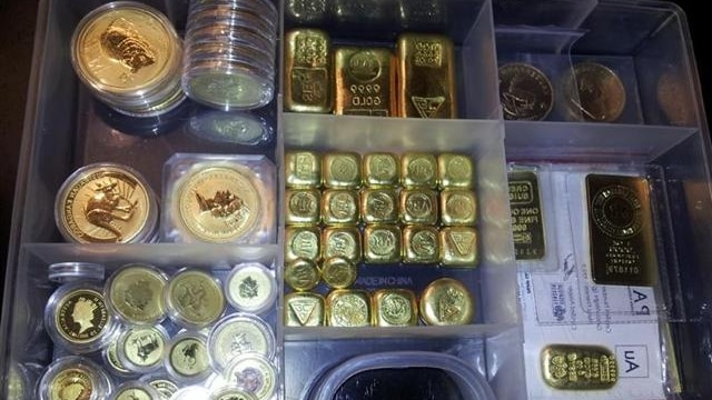 Silver and gold bullion and coins worth $200,000 have been stolen from a home in Upper Kedron