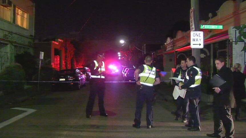 Police on the scene after the discovery of a body in Fitzroy.