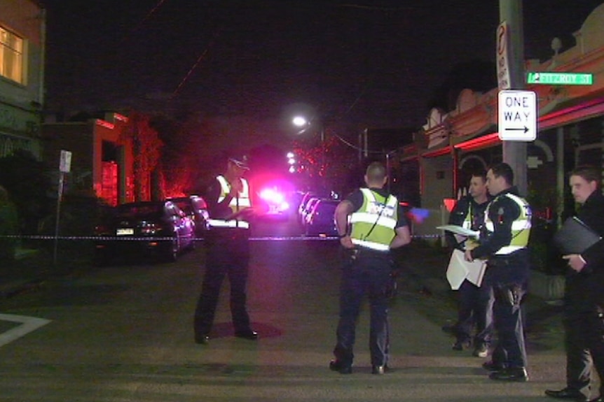 Police on the scene after the discovery of a body in Fitzroy.