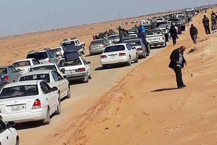 Hundreds of cars make their way down the highway on route to Tawergha