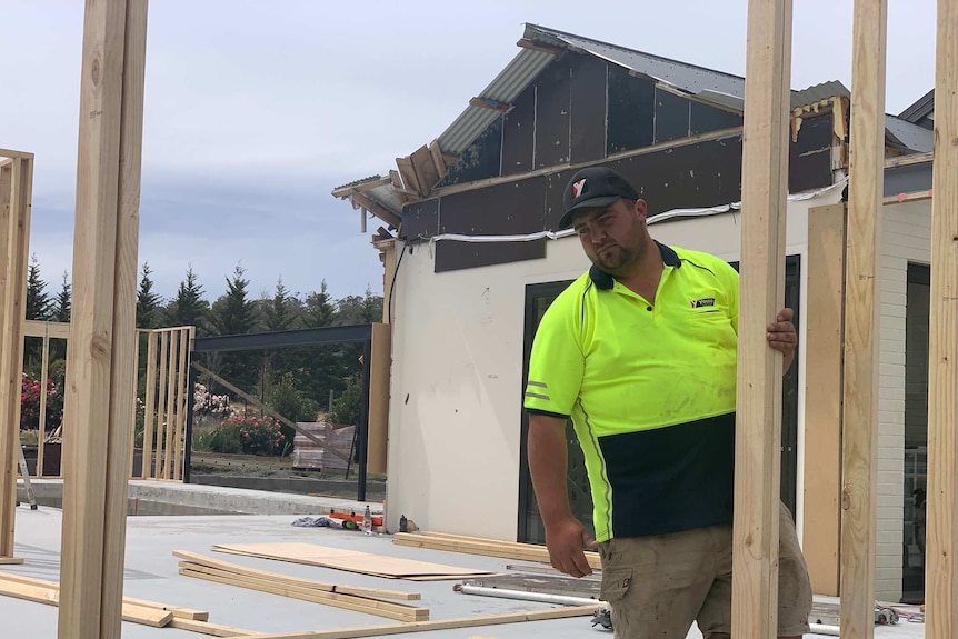 Ethan Cram apprentice builder on a building site.