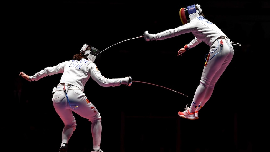 Ana Maria Popescu of Romania competes against Anqi Xu of China during the Women's Epee Team Gold Medal Match in Rio.