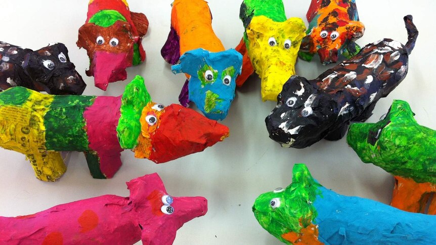 Papier-mache dogs created by the children of Alekarenge School in the NT