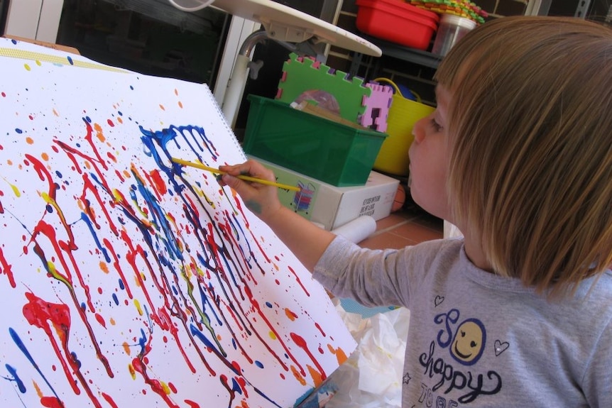 Young girl painting