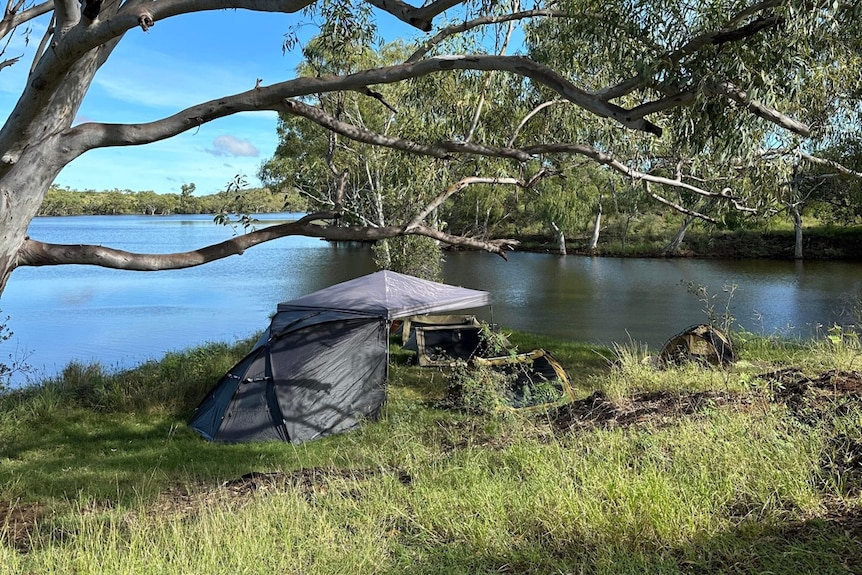 Campsite next to river. 