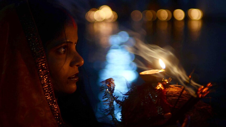 Indian Hindu devotees pay homage during the Chhat Puja festival.