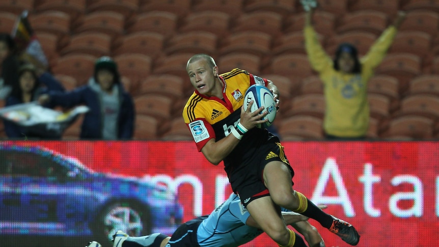 Coasting away ... Robbie Robinson strolls towards the tryline for the Chiefs