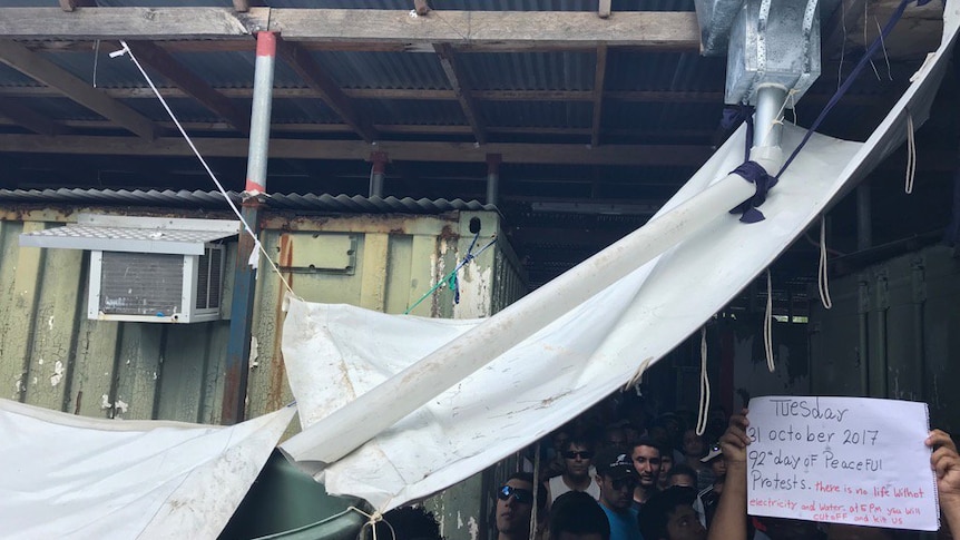 A series of tarps and pipes make up a rain water collection system on Manus