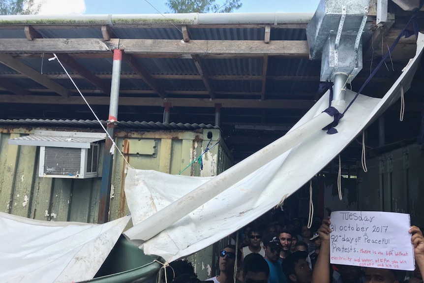 A series of tarps and pipes make up a rain water collection system on Manus