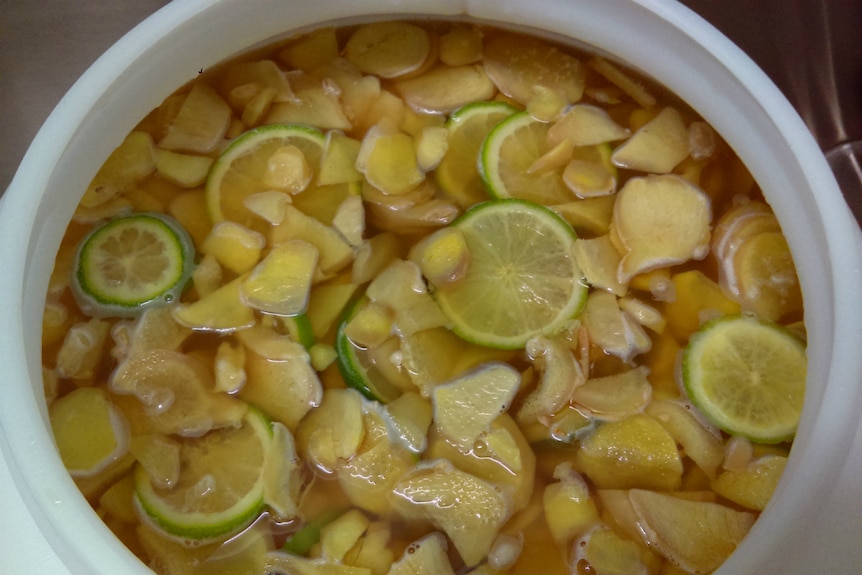 Ginger and lime in a pot.