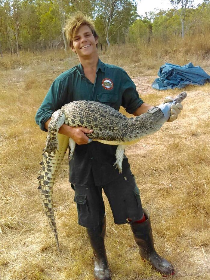 Kenny Peckham with a crocodile at Crocodylus Park.