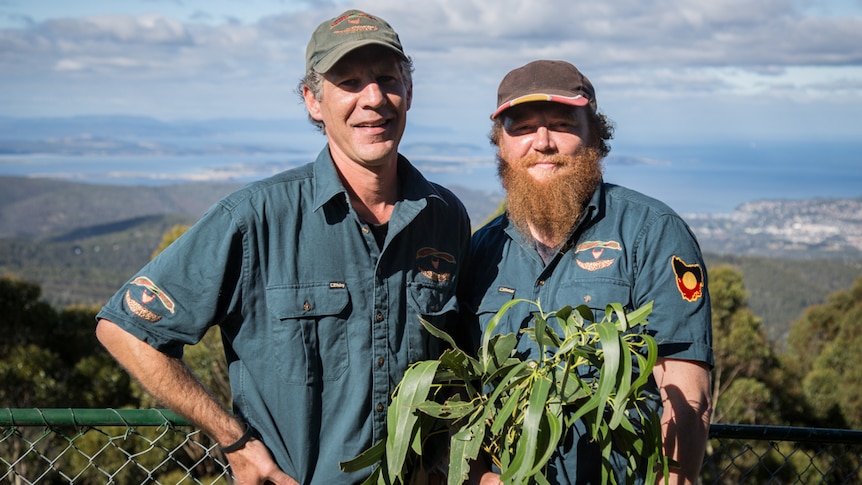 Tasman Langford and Sheldon Thomas of Trowunna Tours show the cultural roots of kunanyi.