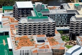 A $330 million Fiona Stanley Hospital cost blowout has been blamed on the former Health Department chief Kim Snowball.